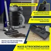 A person is using a wet/dry vacuum cleaner to clean up dirt and liquid. Produktbild-Vorschau