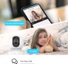 A split image showing a smartphone displaying a live feed from a security camera, and a child lying in bed with a stuffed animal, with a security camera in the foreground. Voir les images du produit