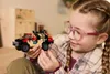 LEGO Jurassic World Raptor : Poursuite en 4x4 - 2 figurines Voir les images du produit 8