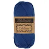 A ball of blue yarn with a brown label. Produktbild-Vorschau