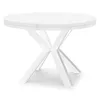 A white round dining table with a striking X-shaped base is shown against a white background. Voir les images du produit