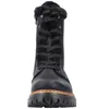 A front view of a black lace-up boot with faux fur trim. Voir les images du produit