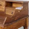Close-up view of a wooden desk with a drawer and shelf. Náhled obrázku produktu