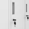 Close-up view of two white metal lockers with keys in the locks. Náhľad obrázku produktu