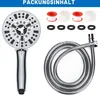 A shower head and hose set with accessories, laid out on a white background. Produktbild-Vorschau