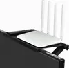 A close-up shot of a black TV shelf holder with a white router and four white antennas on top. Produktbild-Vorschau
