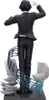 A statue of a character from Hunter x Hunter, Chrollo Lucilfer, in a black suit, standing on a base with abstract musical elements. Produktbild-Vorschau