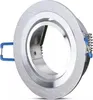 A close-up studio shot of a silver recessed light fixture with blue spring clips. Voir les images du produit