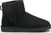 A single black Ugg boot is shown from a side-angle on a white background. Voir les images du produit