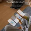 A person is holding a smartphone displaying a robot vacuum app interface, with multiple app screens overlaid. Produktbild-Vorschau