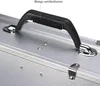 A close-up view of a silver case with a black handle. Náhled obrázku produktu