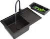 A black kitchen sink with a faucet running water into it, and a colander with cucumbers next to it. Podgląd zdjęcia produktu