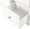 A close-up view of an open white drawer with a gold knob, revealing the interior of a piece of furniture. Produktbild-Vorschau