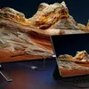 A tablet is connected to a large monitor using a USB-C adapter cable, displaying a landscape image on both screens. Podgląd zdjęcia produktu