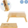A bamboo laptop table shown from multiple angles and with visual cues indicating adjustability. Náhľad obrázku produktu