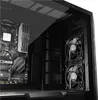 Interior view of a computer case, showing the motherboard and fans. Produktbild-Vorschau