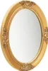 A close-up, studio shot of an oval, baroque-style wall mirror with a gold frame. Náhľad obrázku produktu