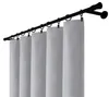 A set of gray curtains hanging from a black curtain rod. Produktbild-Vorschau