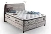 A bed with a mattress and headboard, set against a white background. Produktbild-Vorschau