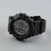 A black digital watch is shown against a light gray background. Náhled obrázku produktu