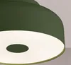 A close-up view of a green ceiling light fixture with a white diffuser. Produktbild-Vorschau