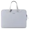 A light gray laptop bag with gray handles and a zipper is shown against a white background. Náhľad obrázku produktu