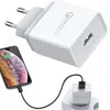 A white USB wall charger with a phone plugged into it, and the charger plugged into a wall socket. Anteprima dell’immagine prodotto