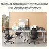 An office setting with adjustable standing desks and ergonomic chairs. Voir les images du produit