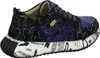 A side view of a single women's sneaker. Produktbild-Vorschau