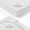 Close-up views of a white fitted sheet, highlighting its features. Produktbild-Vorschau