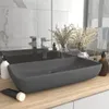 A bathroom countertop with a sink and accessories. Produktbild-Vorschau
