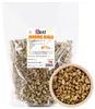 A bag of dried white mulberries next to a wooden bowl filled with the same product. Anteprima dell’immagine prodotto
