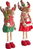 Two plush reindeer figures dressed in festive Christmas attire, standing side-by-side against a white background. Náhľad obrázku produktu
