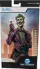 The image shows the packaging for a McFarlane DC Multiverse The Joker action figure. The packaging features artwork of The Joker holding a playing card, with a cityscape and moon in the background. Podgląd zdjęcia produktu