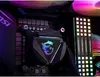 Close-up view of a computer's internal components, including a CPU cooler and RAM modules, with RGB lighting. Produktbild-Vorschau