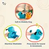A collage of images showing a baby playing with a plush puppy toy, a close-up of the toy's interior, and a hand pressing the toy. Náhled obrázku produktu