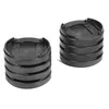 Two stacks of black plastic furniture risers on a white background. Podgląd zdjęcia produktu