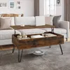 A living room scene with a couch, coffee table, and a robot vacuum cleaner. Produktbild-Vorschau