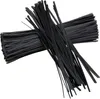 A pile of black twist ties on a white background. Produktbild-Vorschau