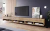 A modern living room with a TV stand and television. Voir les images du produit
