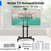 A black TV stand with a TV mounted on it, shown in a room with a window in the background. Náhled obrázku produktu