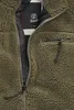 Close-up of a green fleece jacket with a zipper and a brand tag. Produktbild-Vorschau