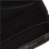 A close-up view of the side and sole of a black sneaker. Podgląd zdjęcia produktu