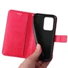 A hand holding a red flip phone case open, revealing the black interior where a phone would be placed. Produktbild-Vorschau