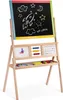 A wooden easel with a blackboard, whiteboard, abacus, and alphabet display, along with art supplies on a shelf. Voir les images du produit