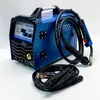 A blue welding machine with cables and accessories on a white background. Produktbild-Vorschau
