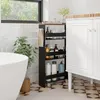 A bathroom setting with a bathtub, vanity, and a narrow rolling cart filled with toiletries. Voir les images du produit