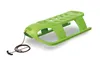 A green plastic sled with a rope and handle is shown against a white background. Náhled obrázku produktu