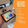 A child's hand using a stylus on a tablet, with toys and a roll of paper in the background. Produktbild-Vorschau