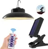 A collage of images showing a solar-powered hanging lamp, its remote control, and a solar panel with a clip. Anteprima dell’immagine prodotto